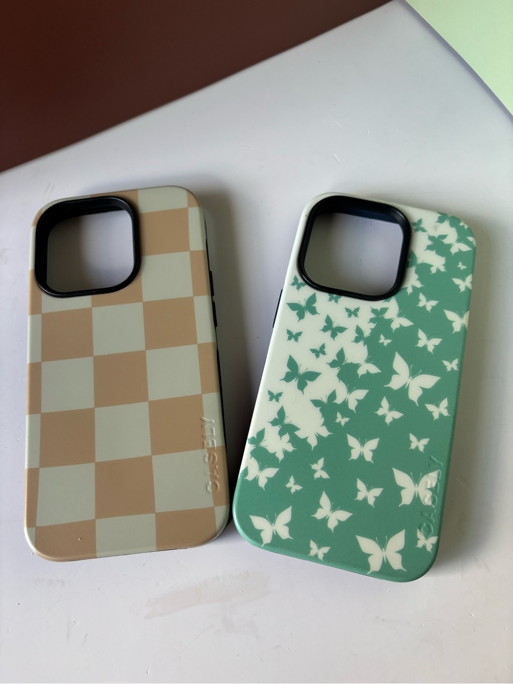 CASELY Green Butterfly & Beige Checker Phone Case Set, iPhone 15